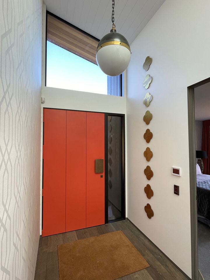 Art adding pop to this entryway.