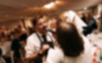 Undercover singing waiter surprising guest at a UK wedding, live entertainment reveal by The Waiter Experience during the wedding breakfast