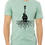 Thumbnail: Man wearing DNB x Pluck It! "Banjo Roots" Mint Tee, guitar roots design graphic