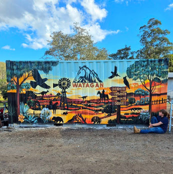 Container mural at Lake Macquarie farm stay showing a sunset tableau with kangaroos, cattle, birds, and windmills in the Watagan region.