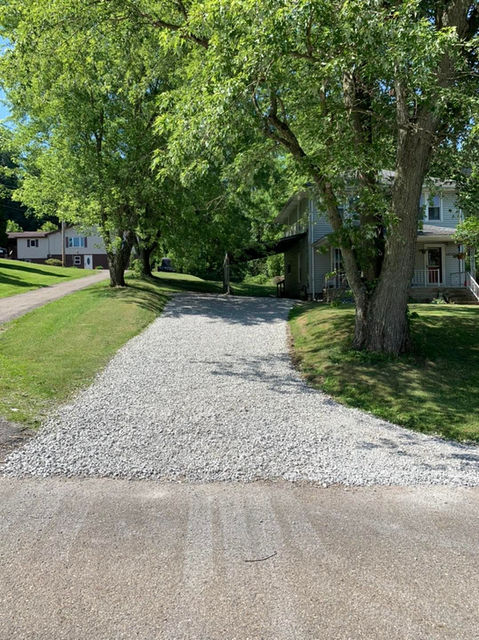 Picture of gravel limestone driveway repair.