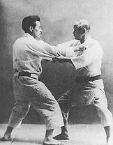 Jigoro_Kano_and_Kyuzo_Mifune_(restoration).jpg