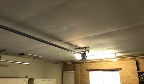 Sagging and bowed gyprock ceiling before repair | BODEK