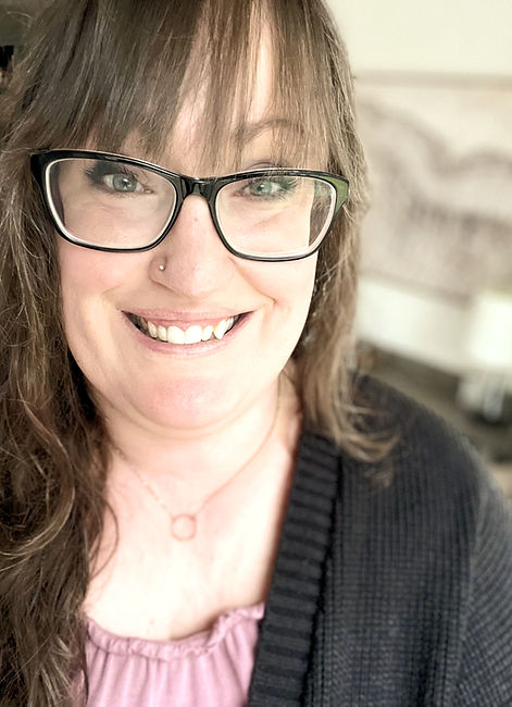 Therapist smiling warmly, conveying compassion and support
