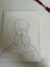 Transferring icon sketch lines onto a wooden board