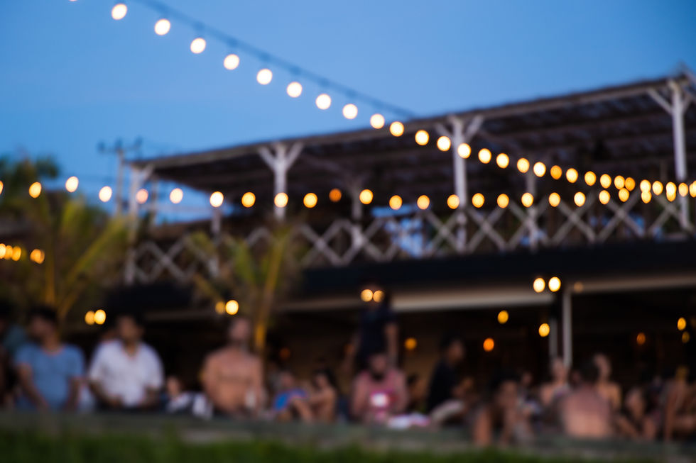 beach-party-sunset-with-friends-closed-swimming-pool-with-ocean-view-blurred-background.jp