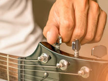 The History of Guitar Tuning: From Standard to Drop D and Beyond