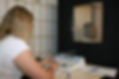 an audiologist doing pure tone audiometry