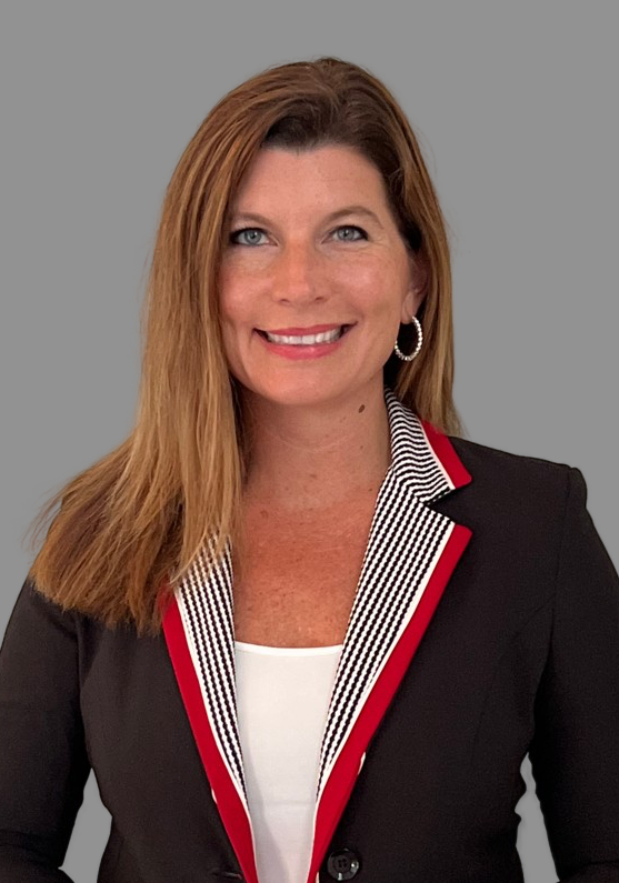 Woman smiling in black blazer