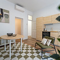 Salón y comedor con cocina integrada - Ejemplo de fotografía inmobiliaria