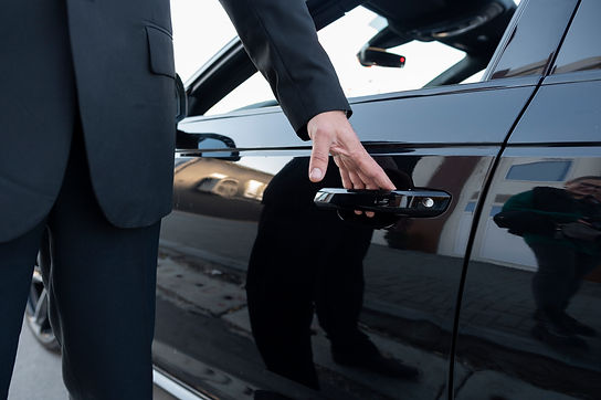 driver-dressed-elegant-costume.jpg