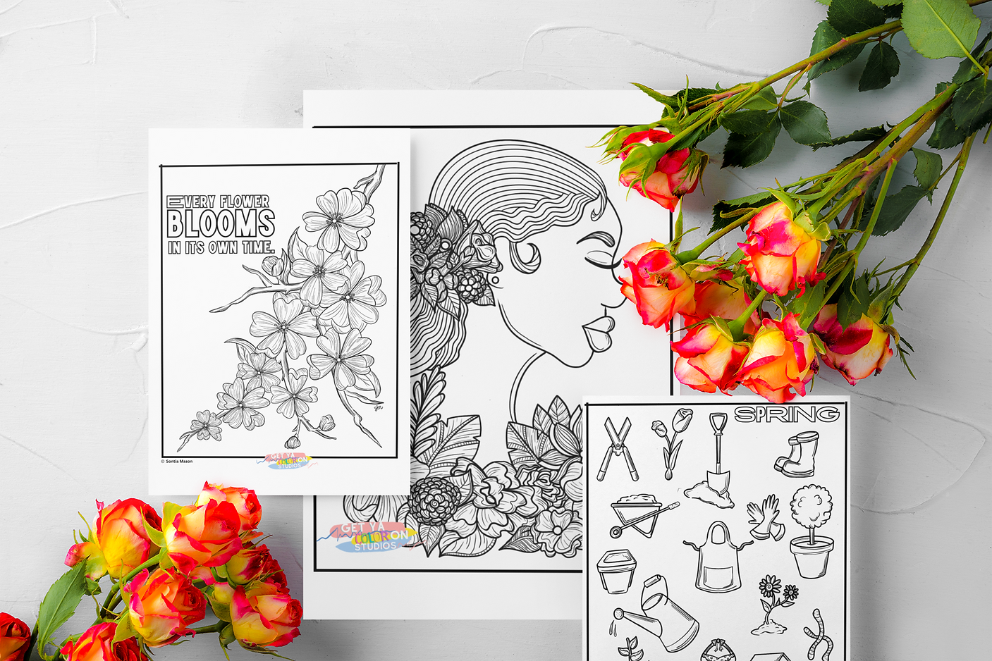 mockup-of-three-wedding-programs-with-some-flowers-around-them-m25161-r-el2.png