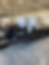 Close-up view of a custom drone spraying trailer in a field
