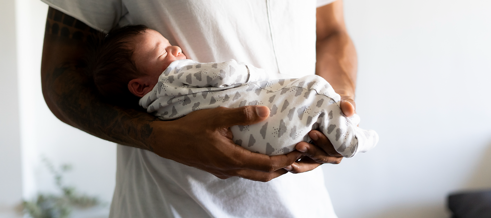 Father with Newborn Baby_edited.png