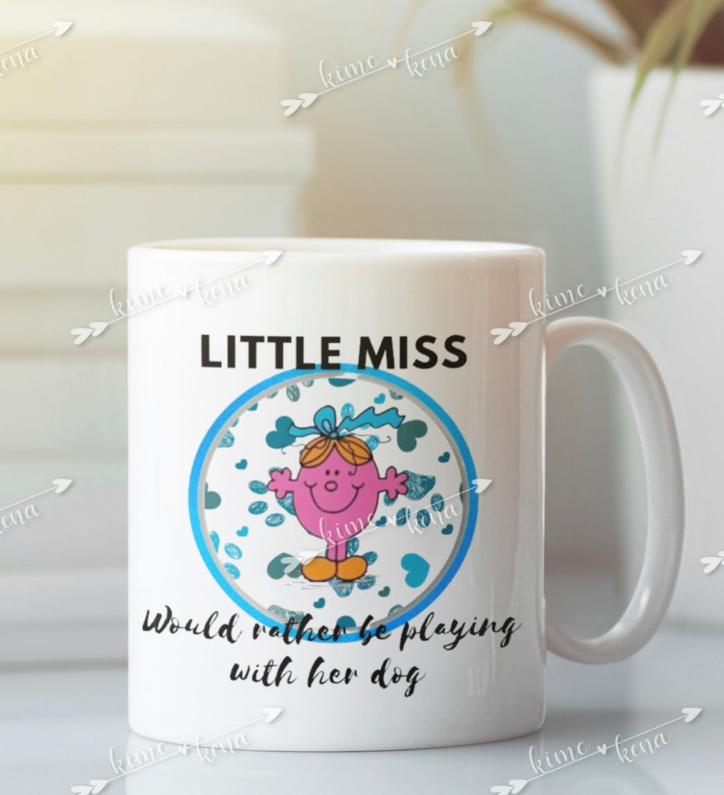 Little Miss “Would rather be playing with her dog”