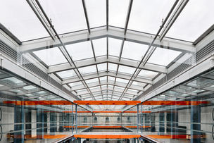Wide interior shot of municipal offices at St. Lawrence Market North, illustrating the building’s weekday civic function