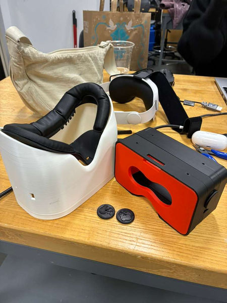 Virtual reality headsets on a wooden table.