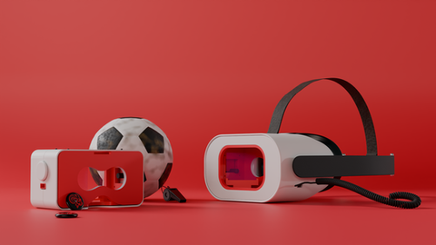 VR headset and soccer ball on red background.