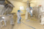 cleaners cleaning industrial kitchen floor.jpg