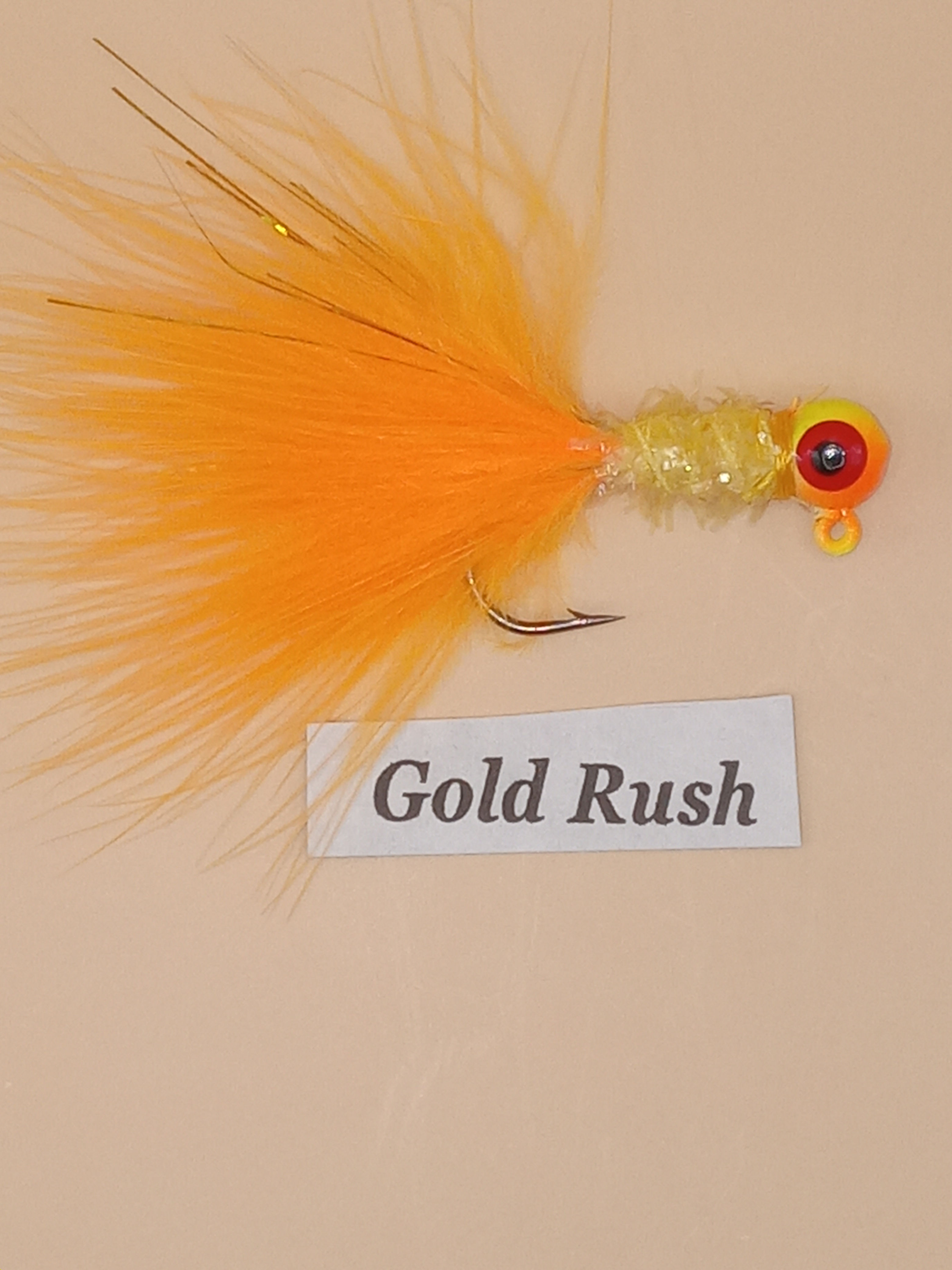 orange hand tied fishing jig.

