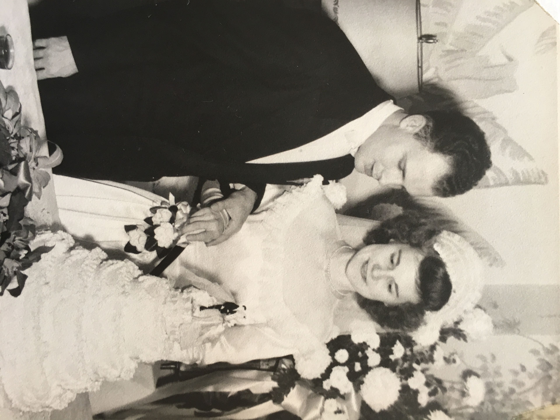 John and Bernice Stiner cutting wedding 