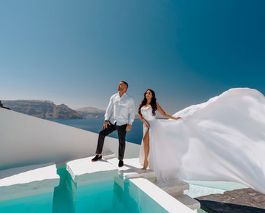 Santorini engagement photoshoot for couples visiting Santorini near the pool