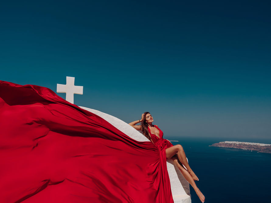 santorini flying dress and white roofs