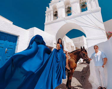 Flying dress photoshoot with horse in Megalochori Santorini