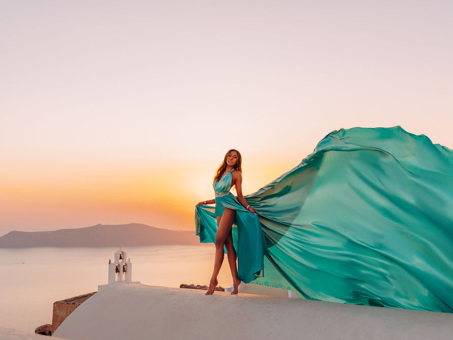 luxury flying dress photoshoot imerovigli sunset panoramic
