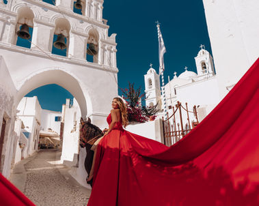 Luxury Santorini photography with horse and ocean backdrop