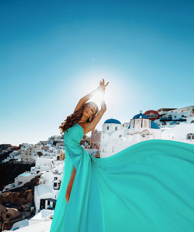 Editorial style Santorini flying dress photography session