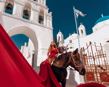 Megalochori Santorini horse photoshoot with flowing flying dress