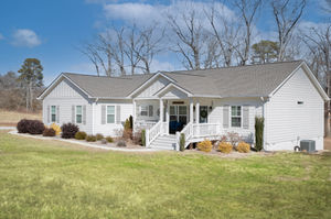 The Craven Plan is a beautifully designed traditional ranch home that offers luxury living with complete customization options. This spacious floor plan includes 3 bedrooms, 2 full baths, and a 2-car garage, providing the perfect balance of comfort, style, and functionality. As a fully customizable design, you can personalize every detail to fit your family’s unique needs and lifestyle. Ideal for those seeking a timeless, functional, and elegant home, The Craven Plan is perfect for your dream home in North Georgia.