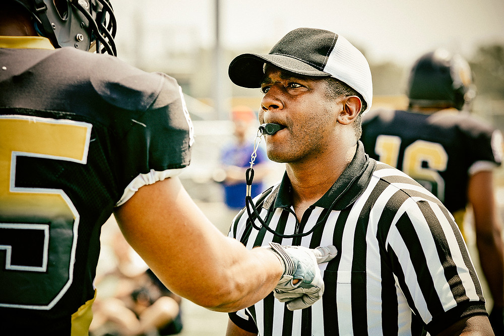 football player and referee
