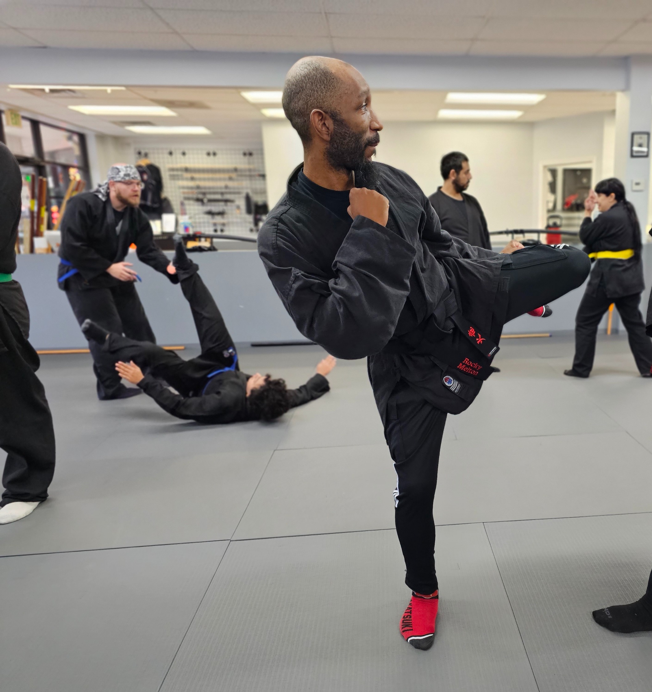 Rocky Melton Sensei throwing a kick during training.