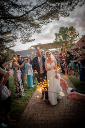 ivy house wedding couple enjoy sparklers at dusk