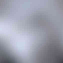 Bride walking down the stairs to the wedding ceremony