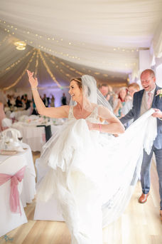 bride at suffolk wedding having fun