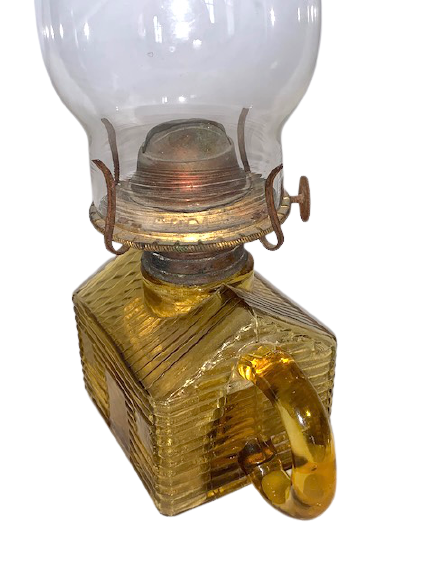 Thumbnail: Amber log cabin whale oil lamp