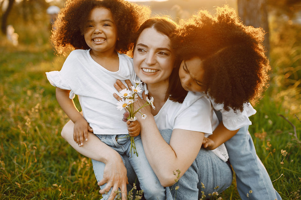 photo-caucasian-mother-two-her-african-american-daughters-embracing-together-outdoors-girl