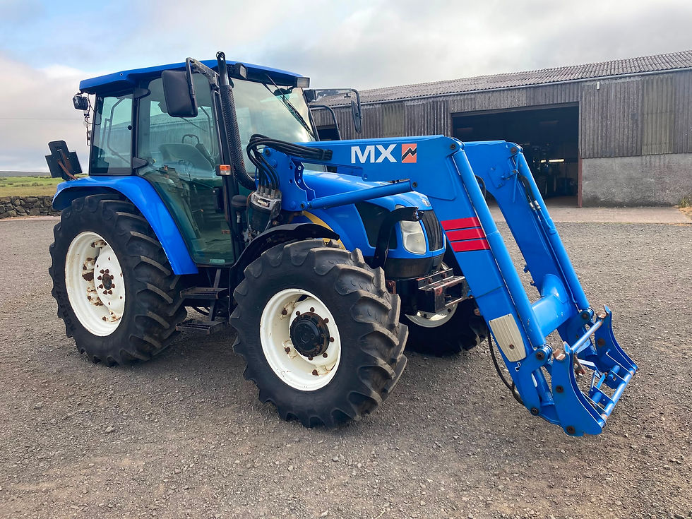 New Holland TL 100A and Loader