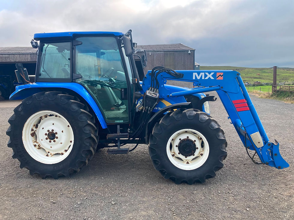New Holland TL 100A and Loader