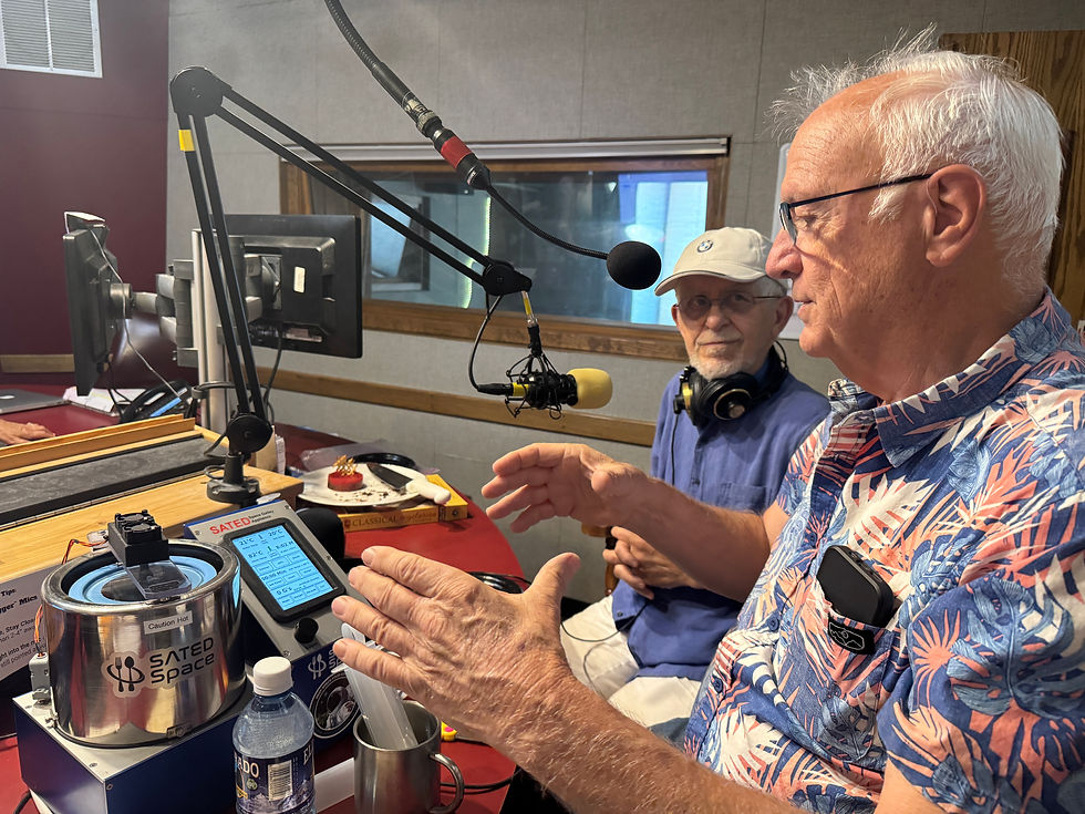 Jim Sears and Chef Ron Pickarski in the KGNU Studio
