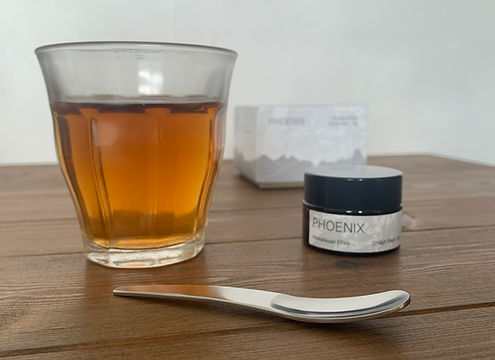 Glass of water with dissolved Himalayan Shilajit resin