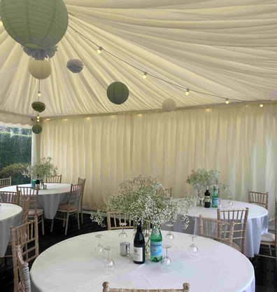 6x6m pagoda with windows, lining, round table and limewash chiavari chairs