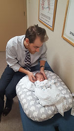 Doctor Kopas with infant patient