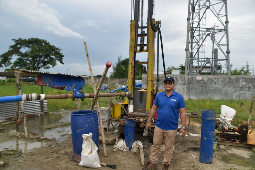Engr. Kristian doing a site inspection before doing a pumping test on the drilling site.