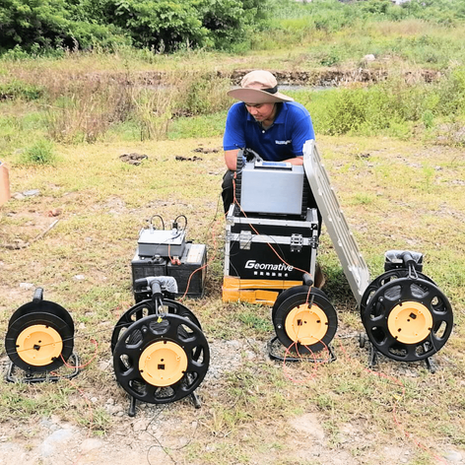 Groundsolv employee checking the setup of the equipment to perform a ground water survey in Aritao, Nueva Vizcaya