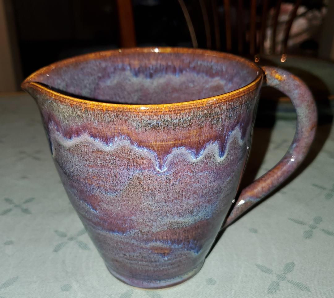 Small pitcher standing 8" tall