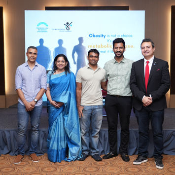 Photographs from the Revivo Obesity Action Meet organized by the Chennai Metabolic Health Foundation in collaboration with Revivo Clinic. The images show expert speakers including Dr. Arun Raghavan, Arvind Ashok, Shiny Surendran, Dr. Supratik Bhattacharya, and Raj Ganpath presenting sessions on obesity, metabolic health, nutrition, muscle health, and obesity treatment. The event features an engaged audience participating in an interactive Q&A discussion. Attendees are also seen undergoing complimentary body composition analysis. The gathering highlights conversations on obesity awareness and metabolic health, with media coverage by The Hindu.